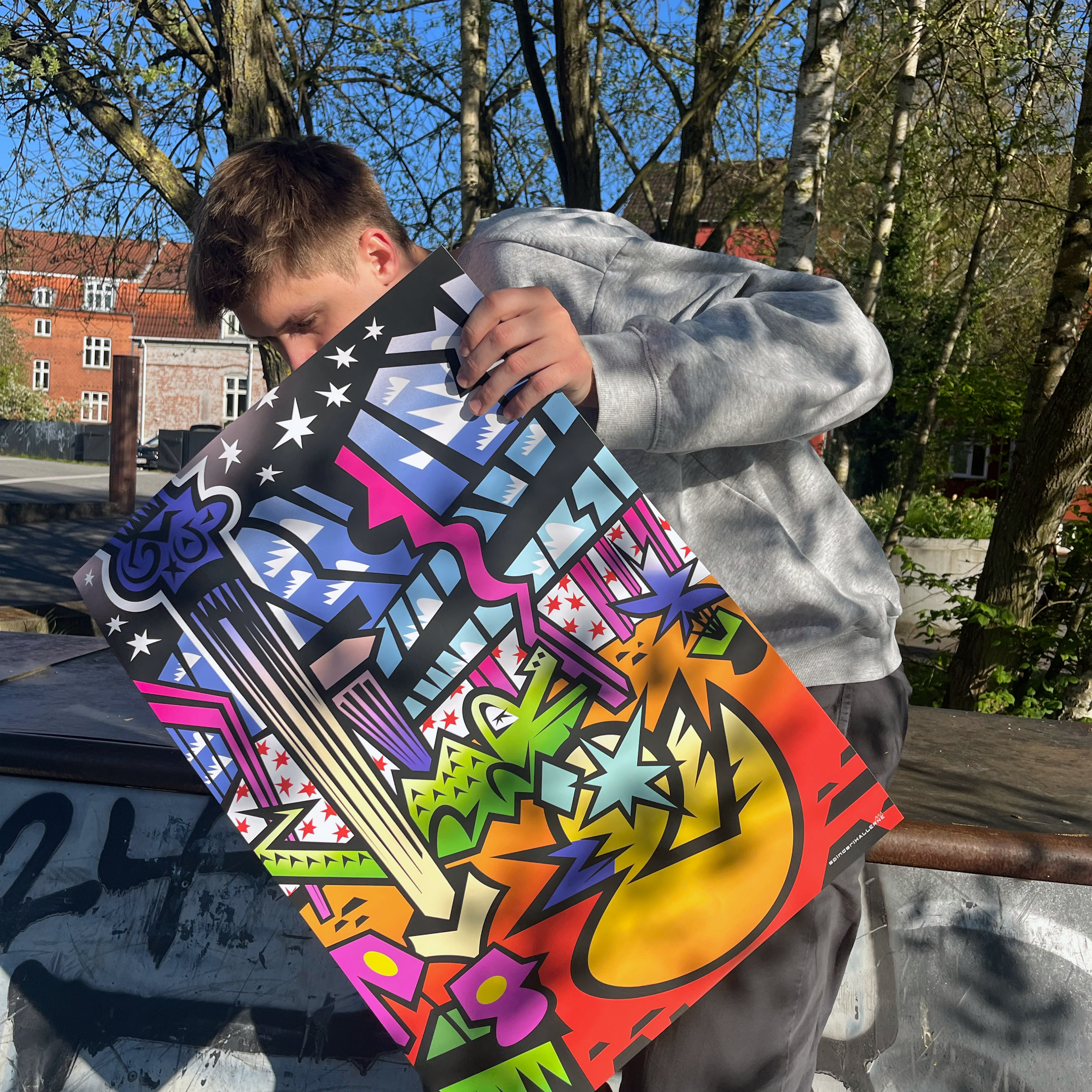 Facio with poster