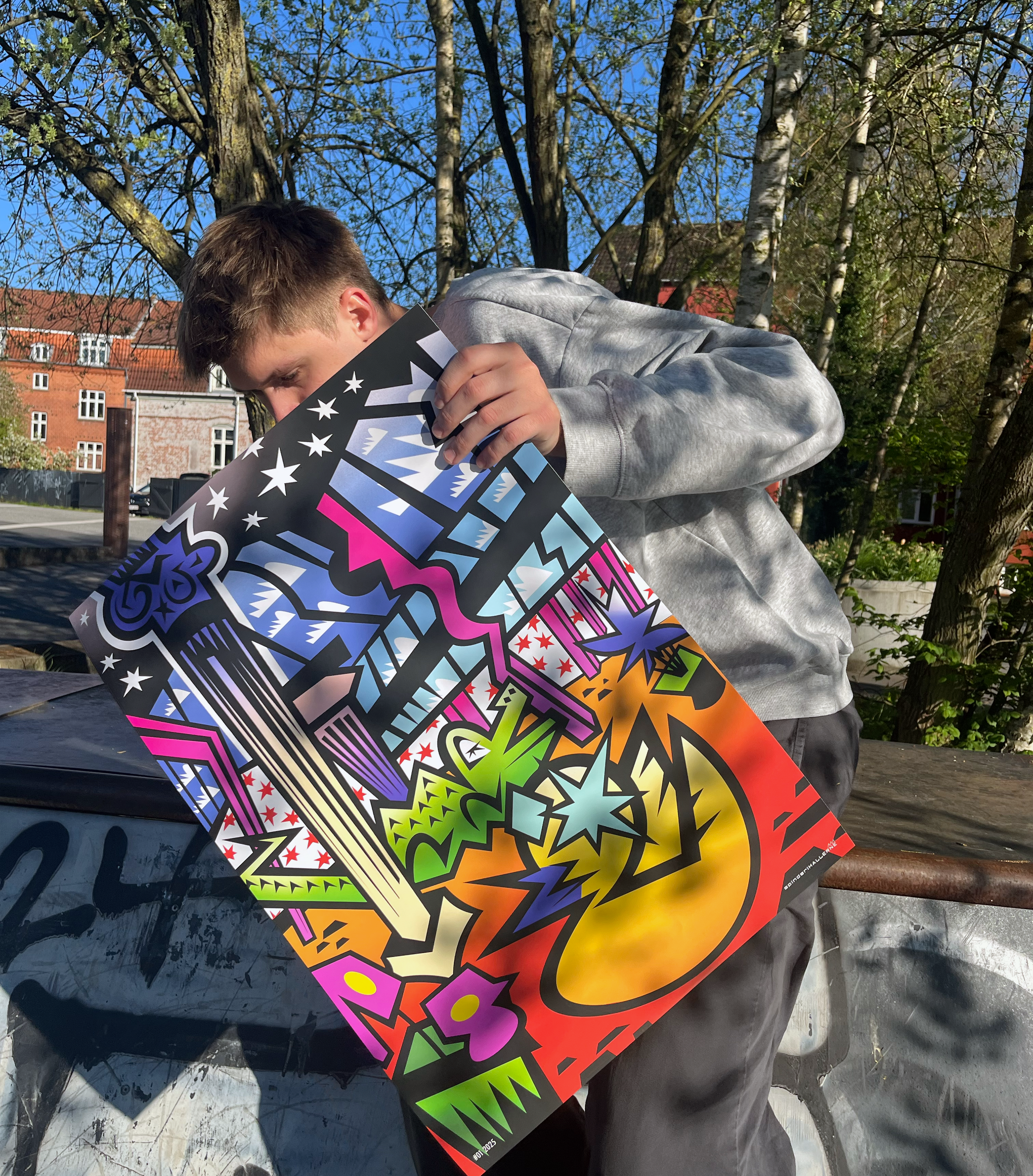 Facio with poster